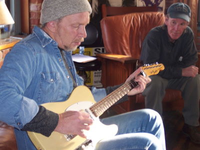 [Bill and Dave Alvin in the studio]