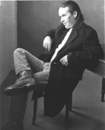 [Bill seated, b&w promo]